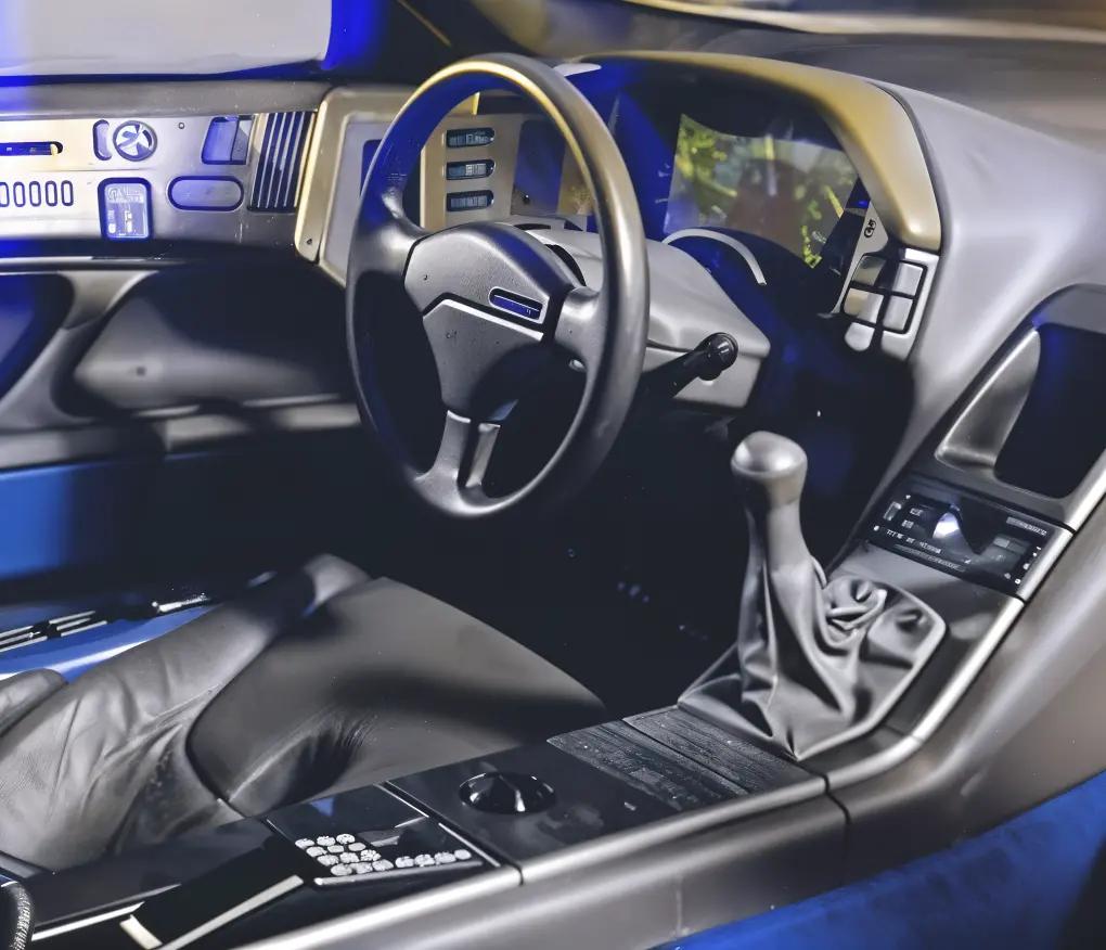 Futuristic interior of the Peugeot Oxia, featuring a digital instrument cluster and luxury details