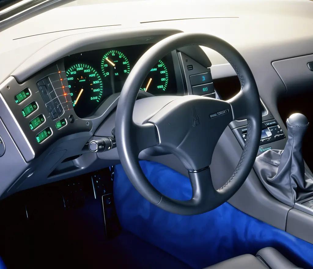Futuristic interior of the Peugeot Oxia, featuring a digital instrument cluster and luxury details"
