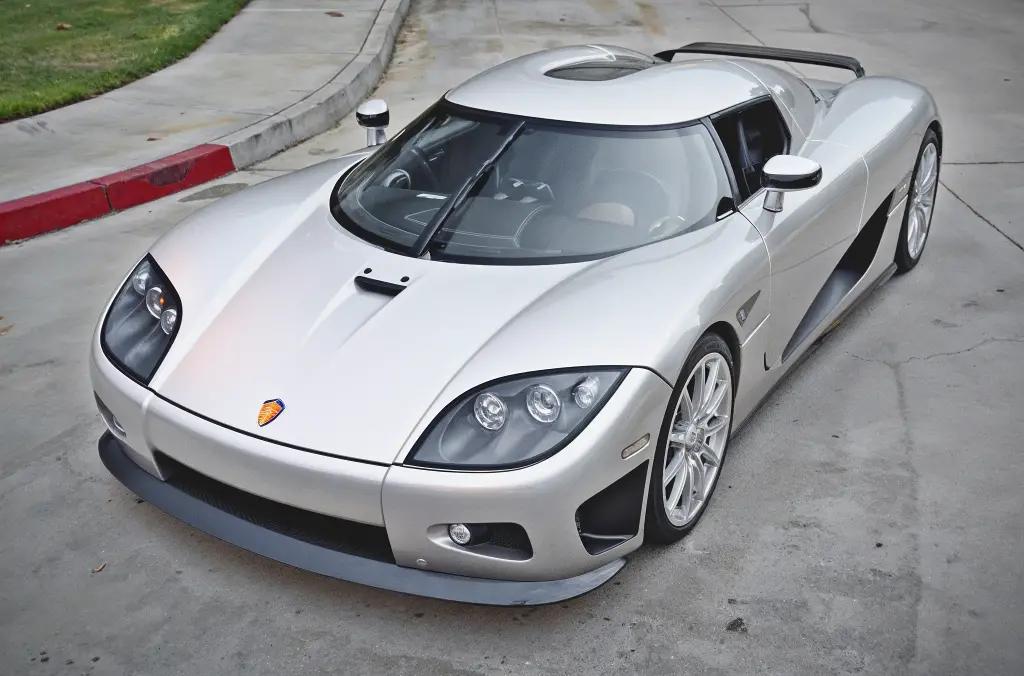 Koenigsegg CCX in silver, with distinctive scissor doors and a sleek design