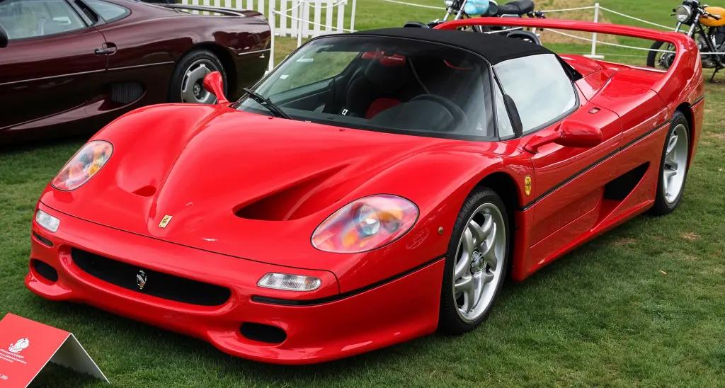 Ferrari F50 supercar in bright red, showcasing its sleek, aerodynamic shape.