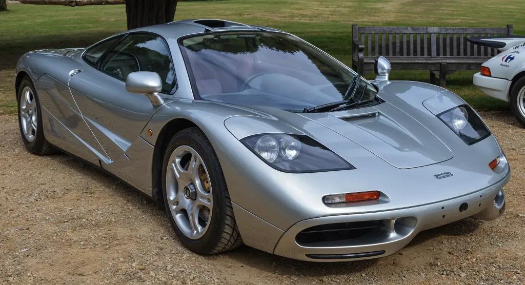 McLaren F1 LM, a rare 1990s hypercar, with an metallic finish and aerodynamic design